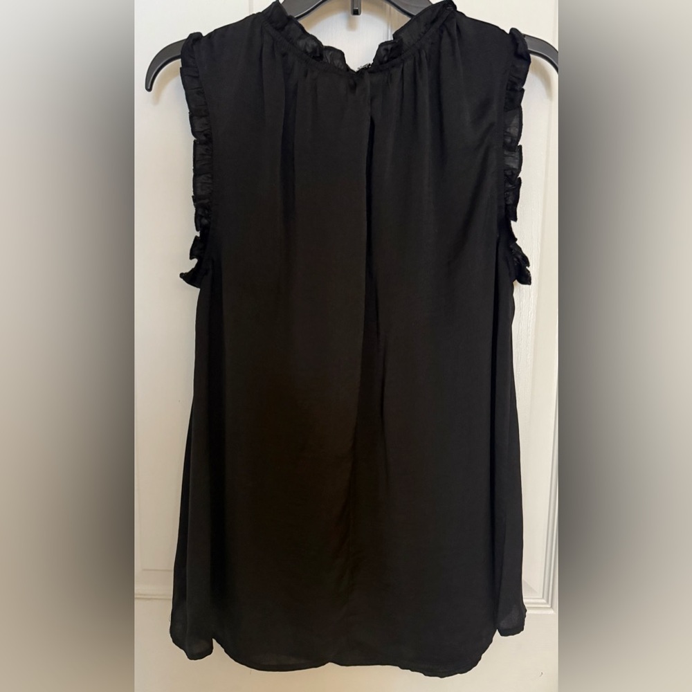 Used Glam Black Ruffled Sleeveless Top
100% polyester but feels silky